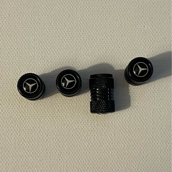 Mercedes Benz Logo valve Stem caps in black set of 4 NWT - Picture 1 of 4